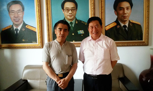 安茂水院长和将军诗书画院秘书长周小献合影.jpg