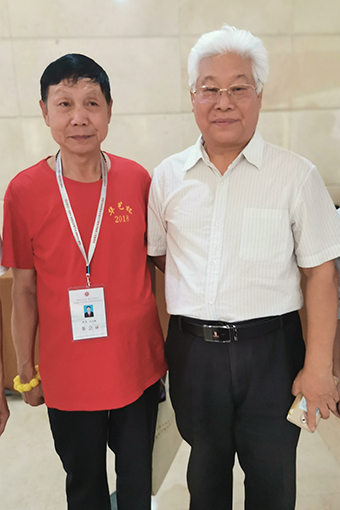 与中国书画家联谊会王子忠主席合影.jpg