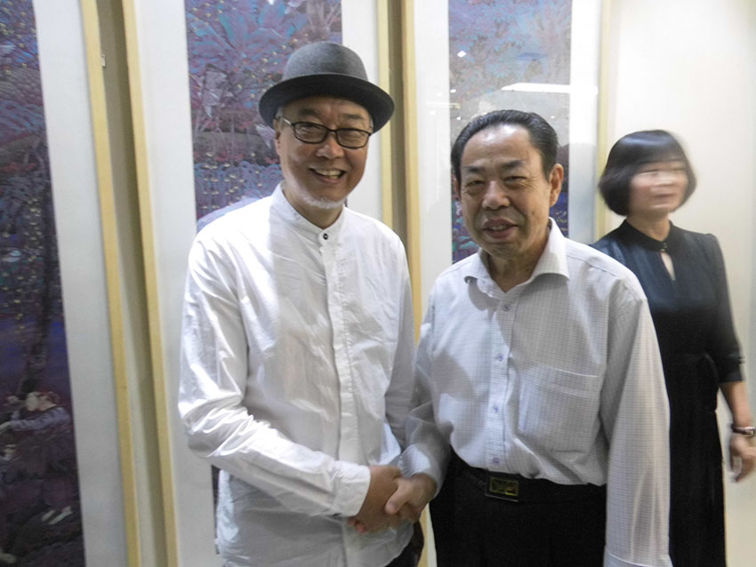 与中国工笔画学会会长陈孟昕合影.jpg
