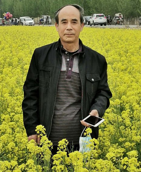 李明江个人照 背景请虚化下.jpg