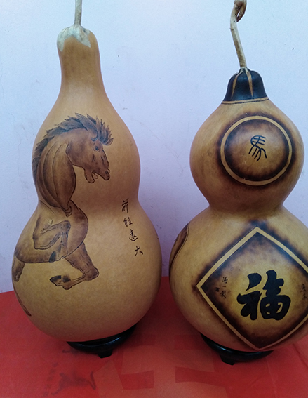 周强一葫芦烙画《前程远大》