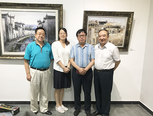 从左依次是：著名词作家纪连祥、新文艺工委会副秘书长徐丽媛、著名剧作家王梓夫、宋庄书画家代表姜彦先生.JPG