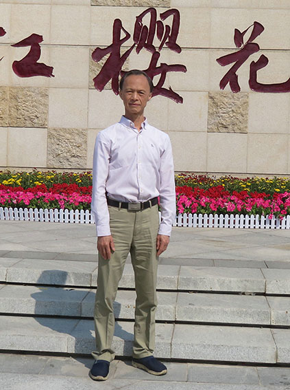 梁建中个人照.jpg